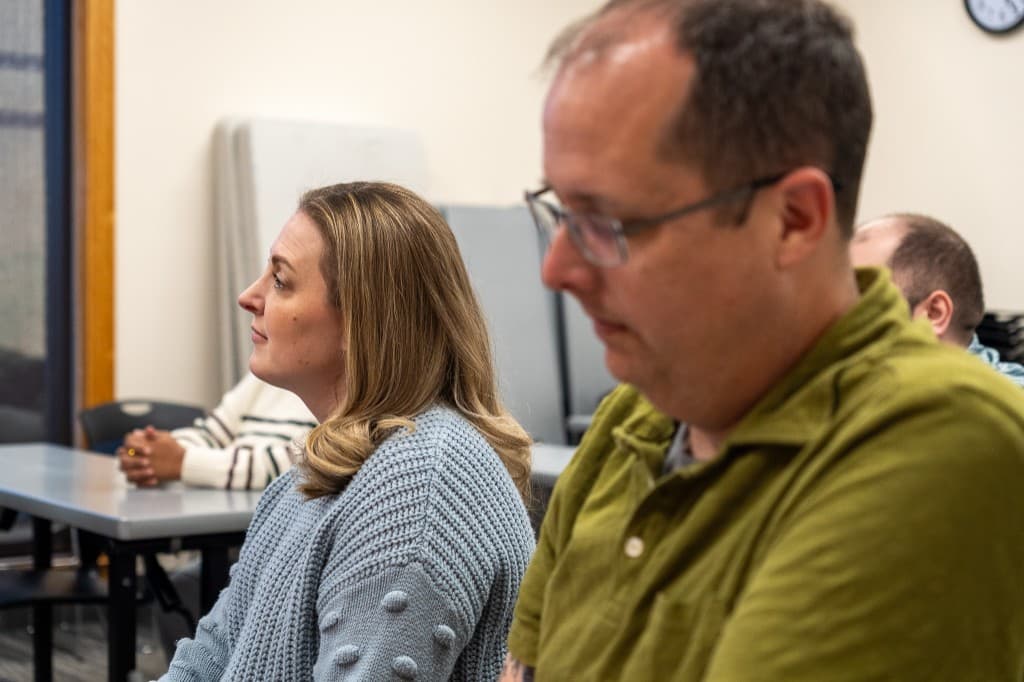 Workshop participants engaged in a faculty session