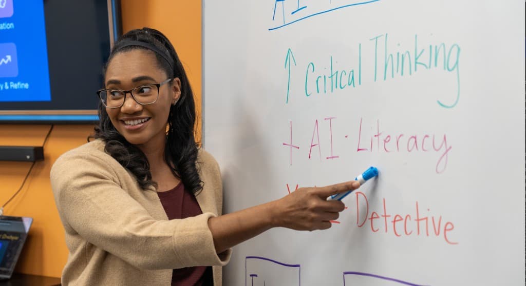 Faculty workshop session at the whiteboard